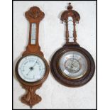 Two 20th century oak banjo barometers bo