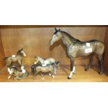 Five Beswick models of horses, including 'Large Racehorse' no.1564, 28.5cm, 'Shire Foal' (large),