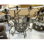 A modern wrought iron and glass hanging six-branch candelabrum, 52cm diameter, 45cm high.