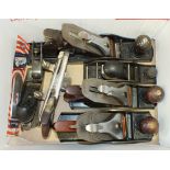 Four Stanley planes, no.5, no.4½, no.4, no.130, a Stanley combination plane and two other planes, (