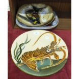 A Puigdemont art pottery circular wall plaque with crayfish decoration, 35cm diameter, two