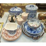 A blue and white willow pattern tureen and cover, two Minton plates decorated with leaves and