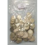 A quantity of British 1920-1946 silver shillings and florins, ___22oz.