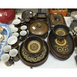 Approximately forty-six pieces of Denby 'Arabesque' oven and coffee ware.