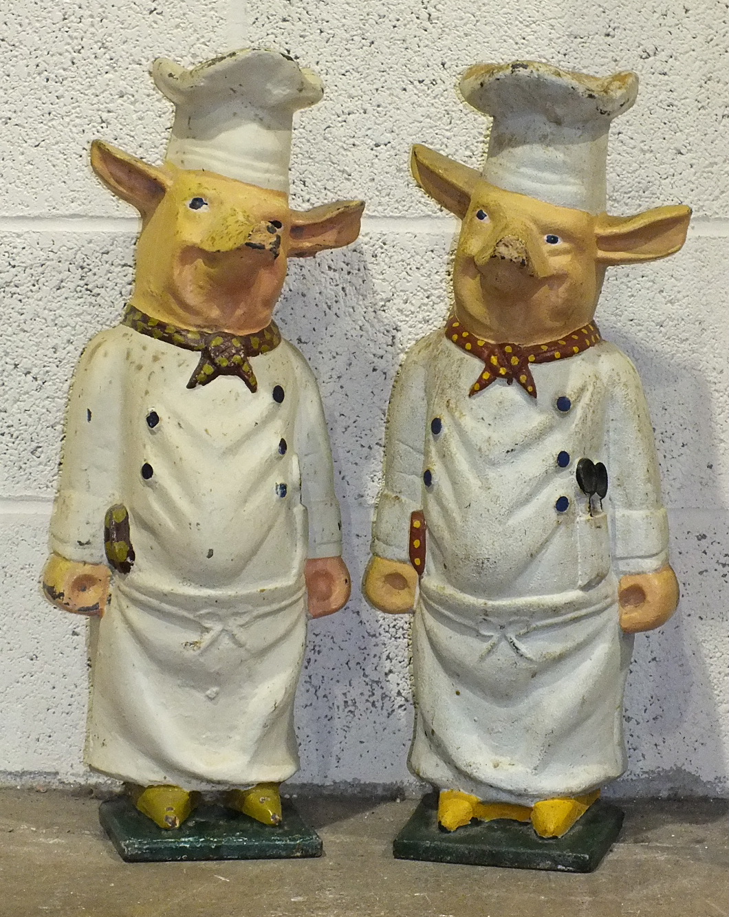 Two novelty painted cast metal pig chef figures, 58cm high, (2).