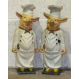 Two novelty painted cast metal pig chef figures, 58cm high, (2).