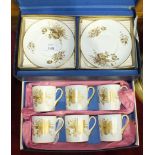 A set of six each Shelley 'Flowers of Gold' coffee cups and saucers, in fitted box.