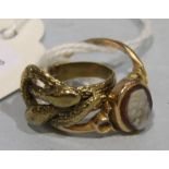 A small gold snake ring, size F and a 9ct gold ring set a hardstone cameo, size Q, total weight 5.