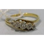 An 18ct gold and platinum crossover ring set five 8/8-cut diamonds, size O, 3g.