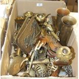 A collection of various brass and metalware, including candlesticks, shell cases and miscellaneous