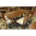 A reproduction figured yew wood twin-pedestal dining table, 183 x 91cm and a set of eight matching