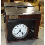 A Gledhill-Brook portable table-top oak case time recorders clock with metal top and carrying