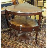 A mahogany two-tier corner table fitted with a single drawer, on splayed front legs, 67cm wide, 80cm