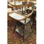 An early-20th century child's stained wood metamorphic high chair and an American turned wood