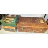 A leather suitcase, 77 x 40cm, 26cm high, one other, a leather-bound photograph album and