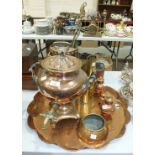 A copper samovar with brass top, 40cm high, a copper circular tray with wavy rim and stylised floral