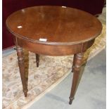 A mahogany circular-top occasional table on turned and reeded legs, 67.5cm diameter, 68cm high.