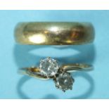 A 9k gold ring set two cubic zirconia stones, size Q and a 9ct gold wedding band, size P½, 8.3g.