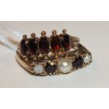 A 9ct gold ring set five garnets, size N and a pearl and garnet set ring (af), size Q, (2), 6g.