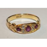 A Victorian 18ct gold ring set rubies and diamonds, size R, 4g.