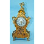A late-19th century French painted wood small boudoir mantle clock of Rococo design, with overall