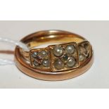 An 18ct gold ring set three square clusters of pearls centred with two rubies and an emerald, (