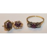 An 18ct gold ring claw set a ruby and two brilliant cut diamonds, size N and a pair of ruby and