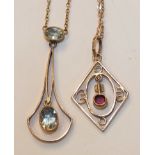 An Edwardian necklace set two aquamarines, (chain af) and another, set garnet and pearl, (2), 4.6g.