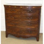 A 19th century mahogany bow-fronted chest, the frieze inlaid with shell motifs above two small and