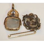 A gold plated swivel watch key fob set bloodstone and chalcedony (af), a plated brooch set hair