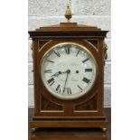 A Regency-style walnut bracket clock, the rectangular architectural form with gilt metal pineapple