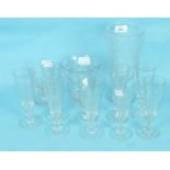 A good 19th century engraved pedestal celery glass, a similar rinser, a set of nine fluted glasses