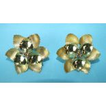 A pair of large 18ct gold earrings of floral form, each of flower-head form with three polished