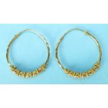 A pair of large 22ct gold hoop earrings, each with bead decoration, 3.5cm diameter, 9.6g.