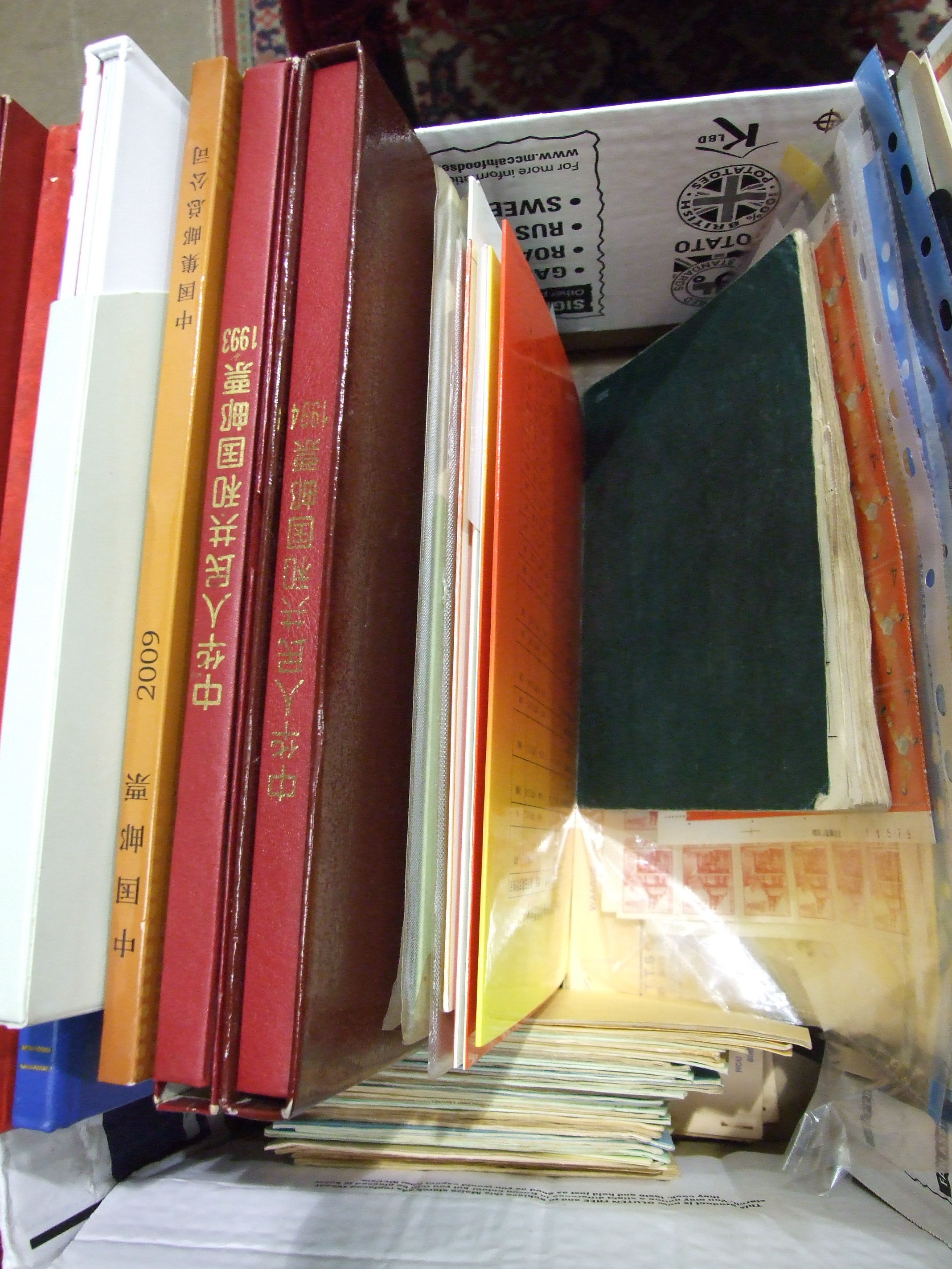 An accumulation of stamps in two stock books, Approved books, presentation books etc, with main