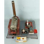 A Wilesco D24 Stationary Steam Engine with burner and solid fuel, base 41x33cm.