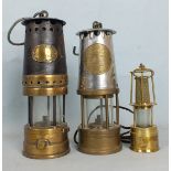 A Patterson Lamps Ltd type GTL9 miner's lamp, a Lamp & Lighting Co. Ltd 'The Protector' miner's lamp