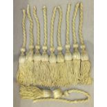 Ten very large curtain tassels, in old gold silk, each 54cm long, on rope, (some af).