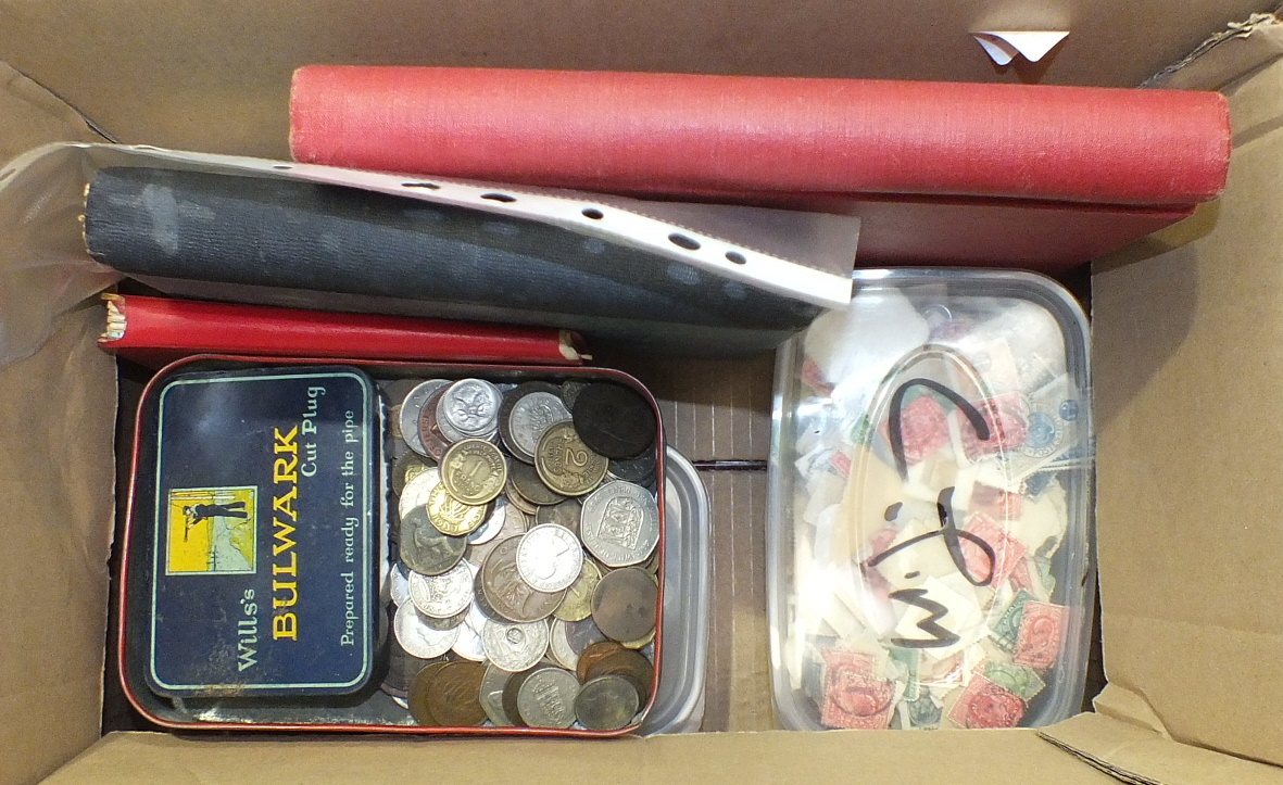 Various stamps and coins in two albums, a stock book and loose.