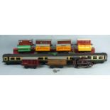 Hornby O Gauge, a Type-40 BR black 0-4-0 tank engine no.82011, nine boxed wagons, including two no.