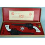 B. M. C. Company (Derby) Ltd Outlaw Gun Set 'The Apache calibre .44', consisting of two diecast,