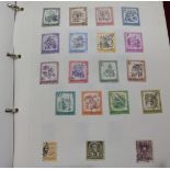 A mint and used collection of stamps in two albums, including China, Great Britain, Hong Kong.