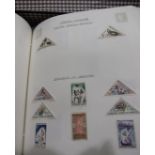Various stamps in three albums and loose, in a small case.