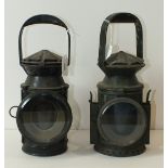 An E K Bowman triple aspect railway lamp dated 1940, 32cm high, and another similar lamp, (2).