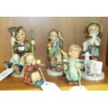 Five Goebel Hummel figures: 'Shepherd's Boy', 'Mountaineer', 'Gay Adventure', 'Boy seated with