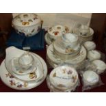 Thirty-eight pieces of Royal Worcester 'Evesham' tea and dinner ware with matching place mats and