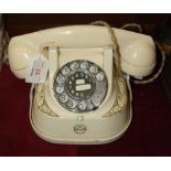 A Belgian RTT 56B cream coloured bell telephone with cream Bakelite receiver.