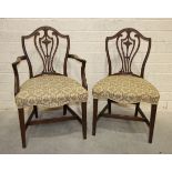 A set of six Adam-style dining chairs with serpentine upholstered seats, on moulded tapered legs and