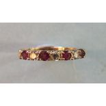 A ruby and diamond half-hoop ring claw-set three brilliant-cut diamonds, set alternately with four