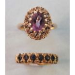 An amethyst and diamond cluster ring in 9ct gold mount, size J, and a 9ct gold half hoop ring.
